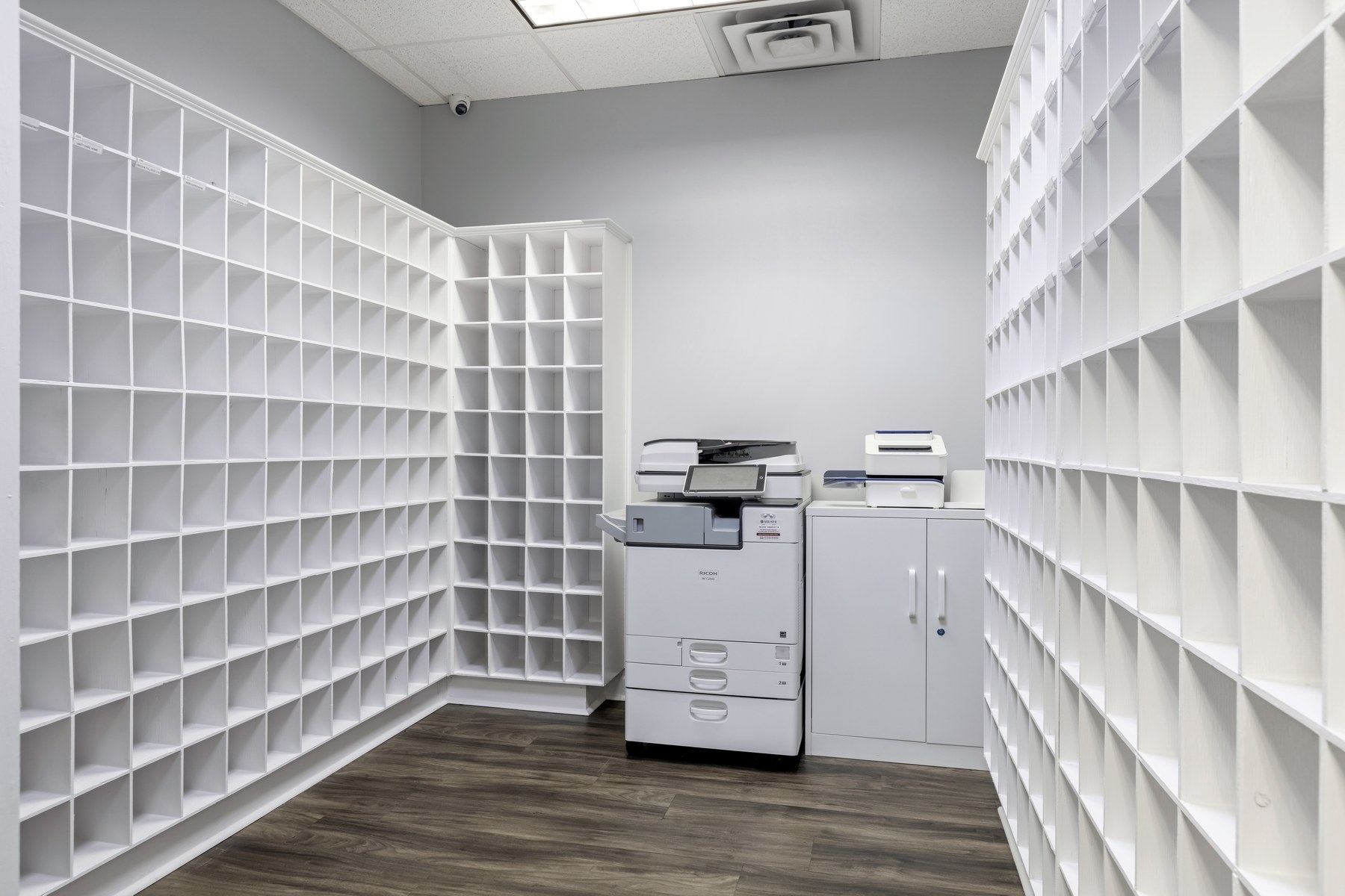 Close-up of tenant mailboxes at Scenic Office Suites showing the business address setup