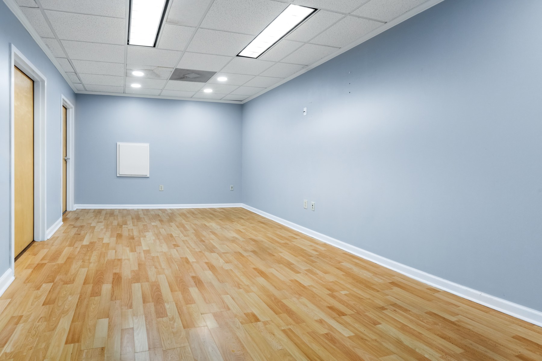 Move-in ready private office at Scenic Office Suites with desk and window light